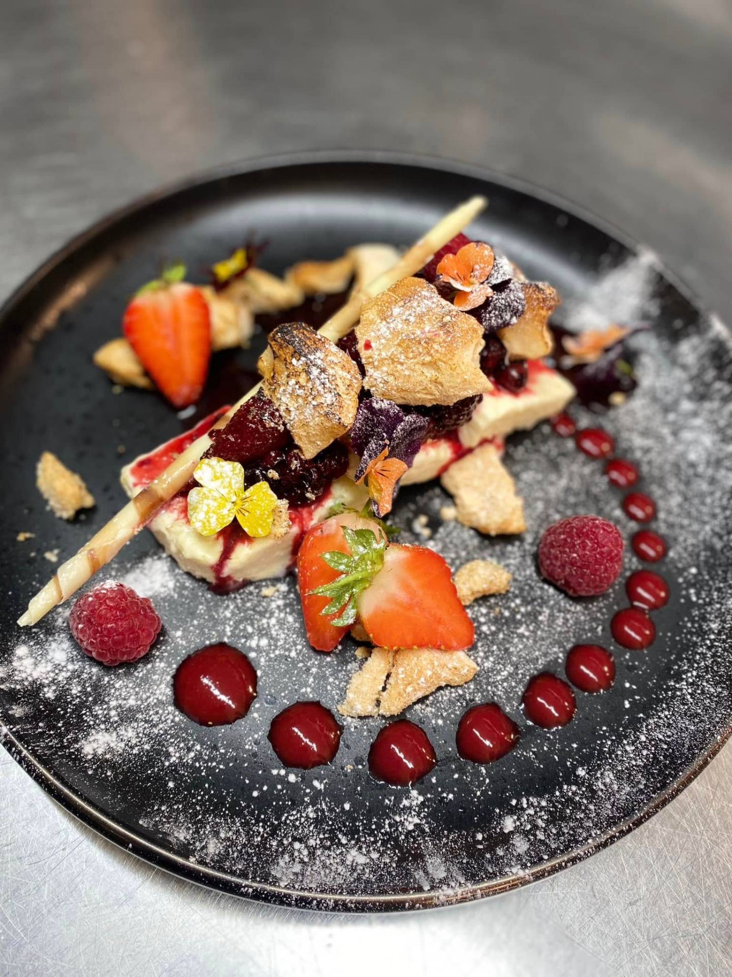 Plated dessert with berries