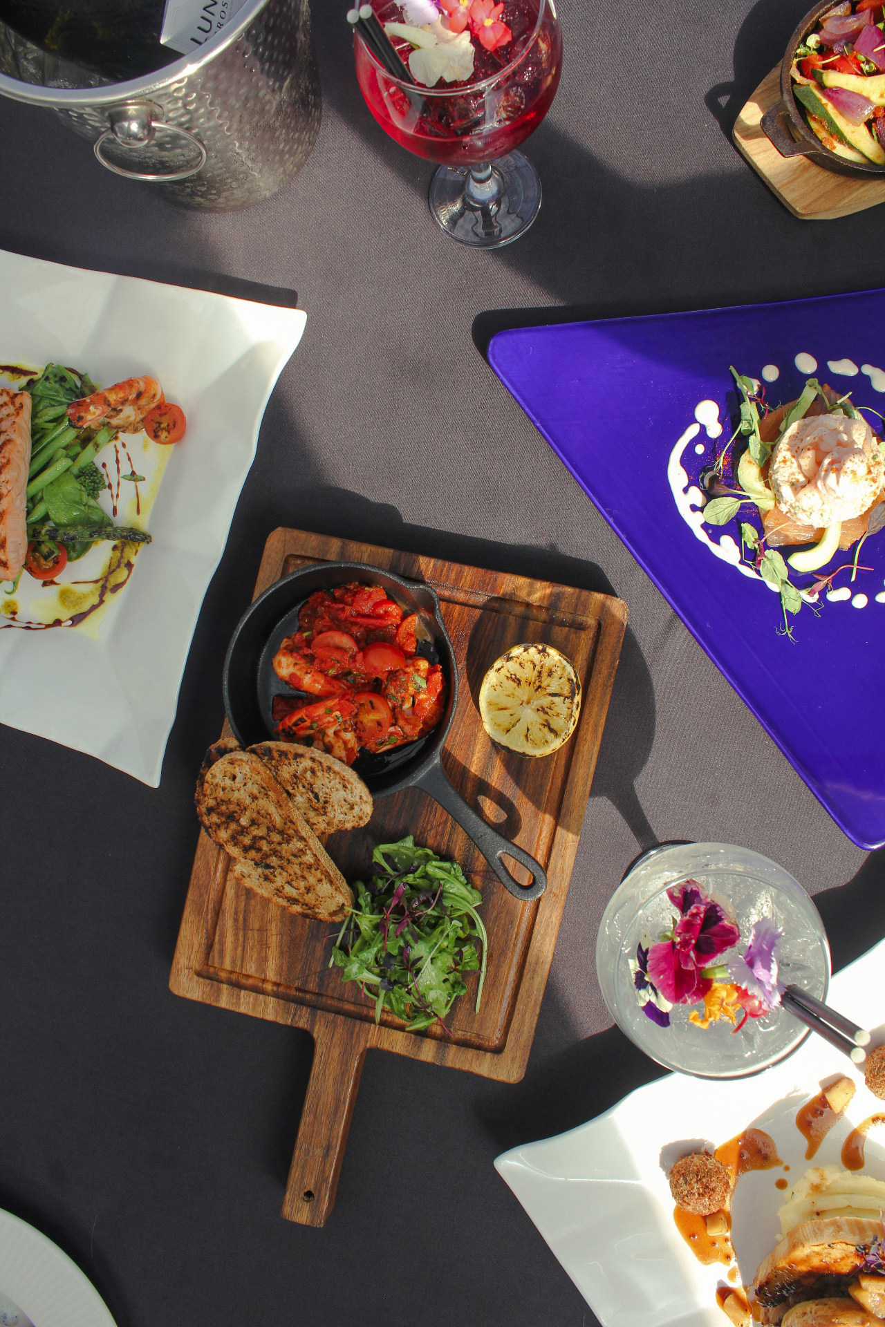 Tapas spread at La Luna with prawns, salmon and cocktails